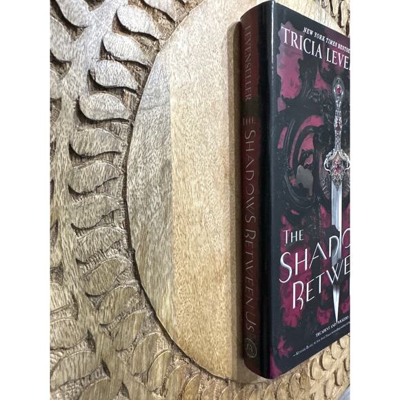 The Shadows Between Us by Tricia Levenseller Hardcover Book Sprayed Edges - Picture 2 of 7